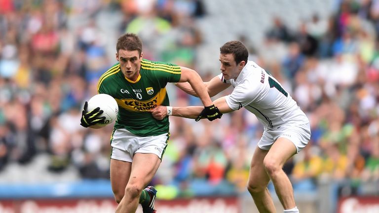 Stephen O'Brien, Kerry, in action against Cathal McNally, Kildare. 