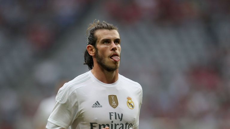Gareth Bale celebrates scoring against Spurs in the Audi Cup