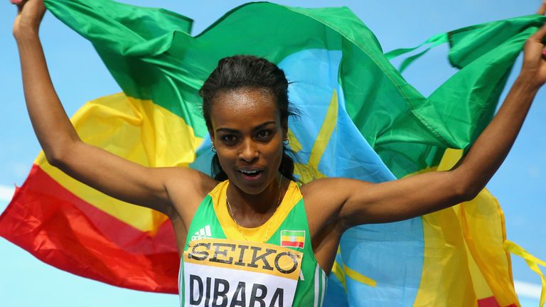 Genzebe Dibaba of Ethiopia celebrates winning the gold medal in the Women's 3000m final during day three of the IAAF World Indoor Championships