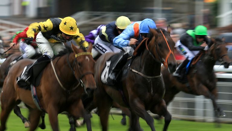 Forgotten Wish, ridden by Pat Dobbs, wins the Absolute Aesthetics Maiden Fillies' Stakes at Goodwood