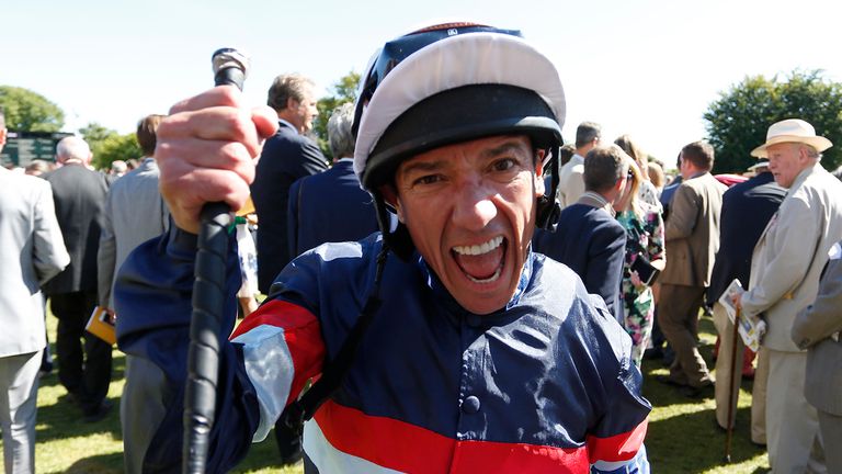 Frankie Dettori celebrates after riding Magical Memory to win the Qatar Stewards' Cup at Goodwood 
