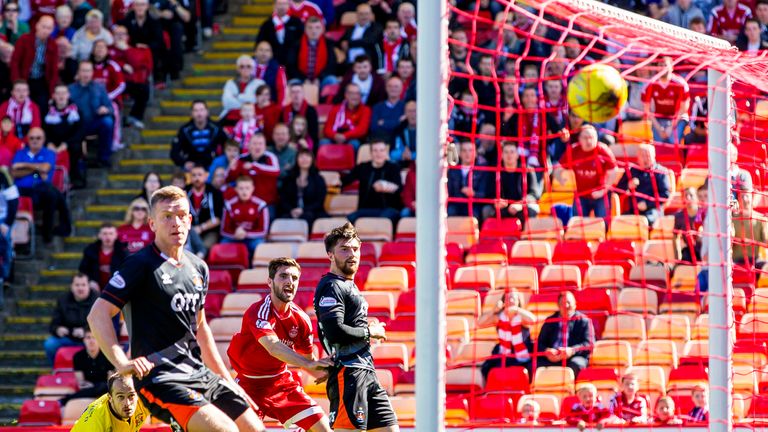 Graeme Shinnie fires Aberdeen ahead against Kilmarnock.