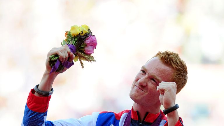 LONDON, ENGLAND - AUGUST 05:  Gold medalist Greg Rutherford of Great Britain pose on the podium for Men's Long Jump on Day 9 of the London 2012 Olympic Gam