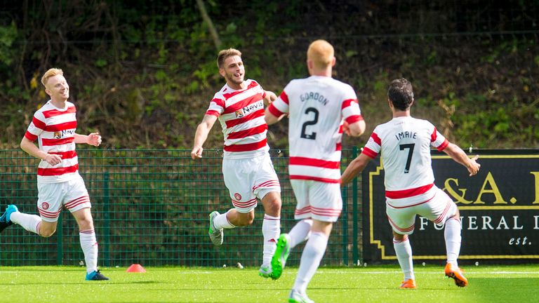 Hamilton's Gramoz Kurtaj (second left) celebrates his goal that broke the deadlock against Hearts
