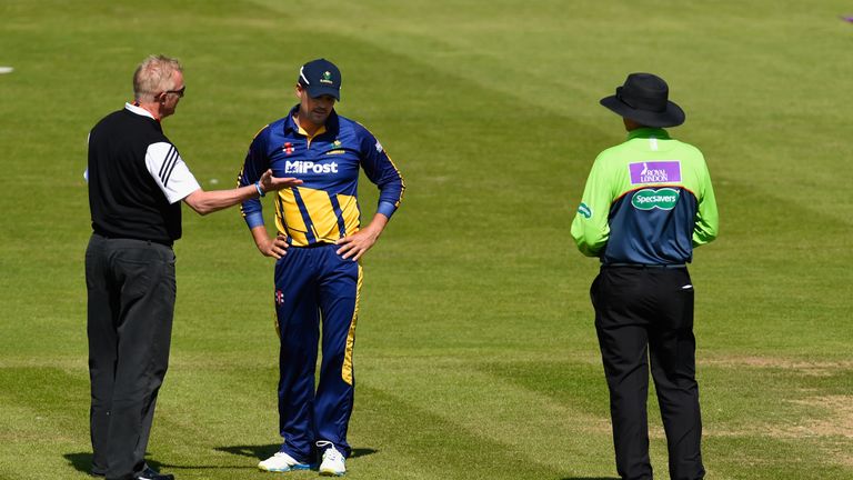 Glamorgan captain Jacques Rudolph (c) chats with match liaison officer Tony Pigott