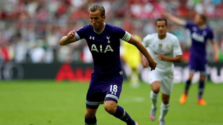 Harry Kane of Tottenham Hotspur runs with the ball during the Audi Cup 2015 match between Real Madrid and Tottenham Hotspur at Allianz Arena on Aug 4, 2015