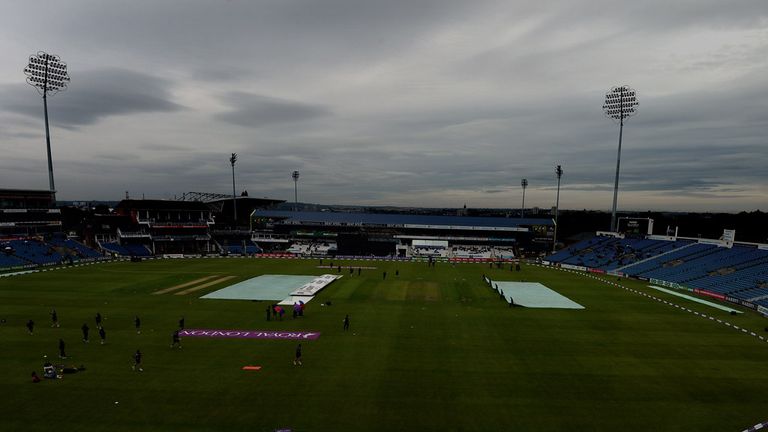 LEEDS, ENGLAND - AUGUST 18:  The covers are brought on as rain delays play in the Royal London One-Day Cup match between Yorkshire Vikings v Northamptonshi