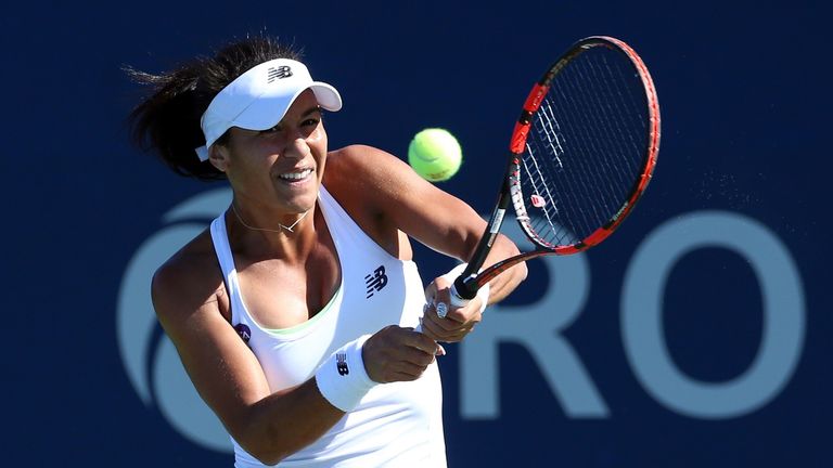 Heather Watson of Great Britain plays a shot against Andrea Petkovic of Germany during Day 3 of the Rogers Cup at the Aviva Centre