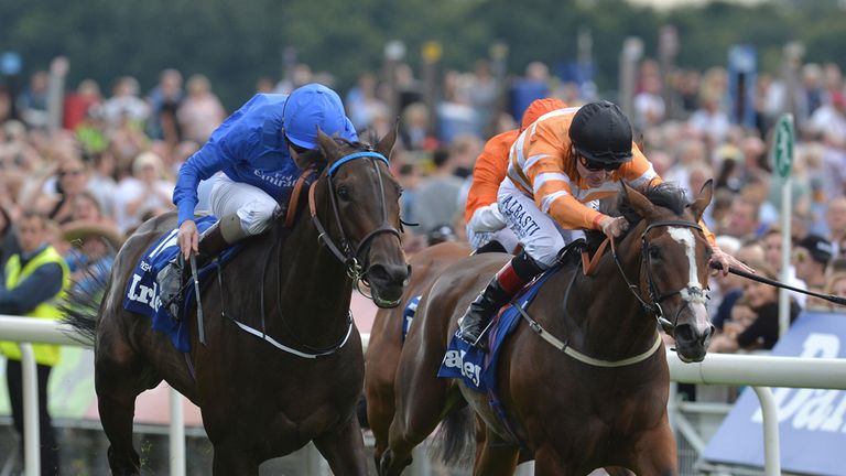Pleascach ridden by Kevin Manning (left) beats Covert Love ridden by Pat Smullen to win the Darley Yorkshire Oaks
