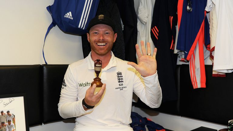 Ian Bell of England celebrates with the Ashes urn