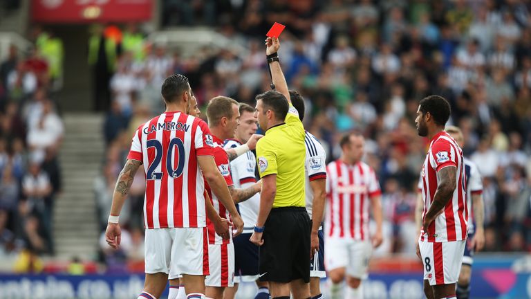 Ibrahim Afellay of Stoke City is shown a red card by referee Michael Oliver 