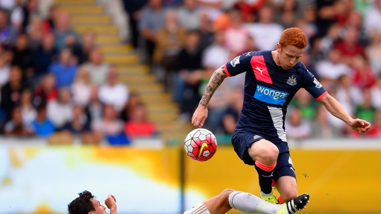 Jack Colback is tackled by Jack Cork