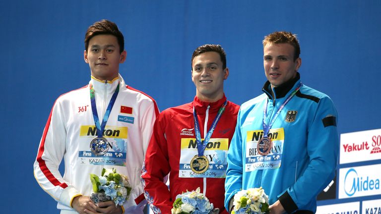 Guy (centre) got the better of Yang Sun (left) and Paul Biedermann (right)