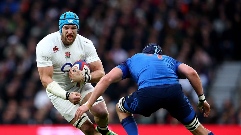 James Haskell of England is challenged by Bernard Le Roux of France during the RBS Six Nations