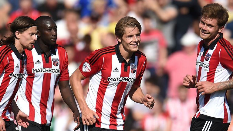 James Tarkowski of Brentford celebrates scoring his side's second goal against Ipswich