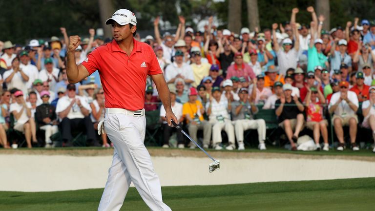 Jason Day of Australia waves after hitting his final putt on the 18th hole during the final round of the 2011 Masters Tournament