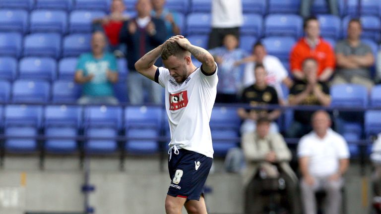  Jay Spearing of Bolton Wanderers leaves the field after receiving a second yellow card