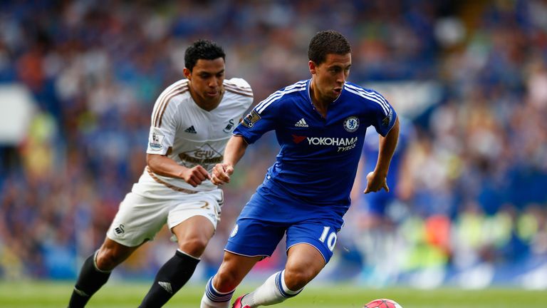 Jefferson Montero (left) tracks Cesc Fabregas