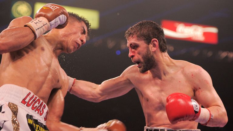 Jessie Vargas (L) of the US and Khabib Allakhverdiev of Russia fight during their WBA Super Lightweight title match at the MGM Grand Arena in Las Vegas, Ne