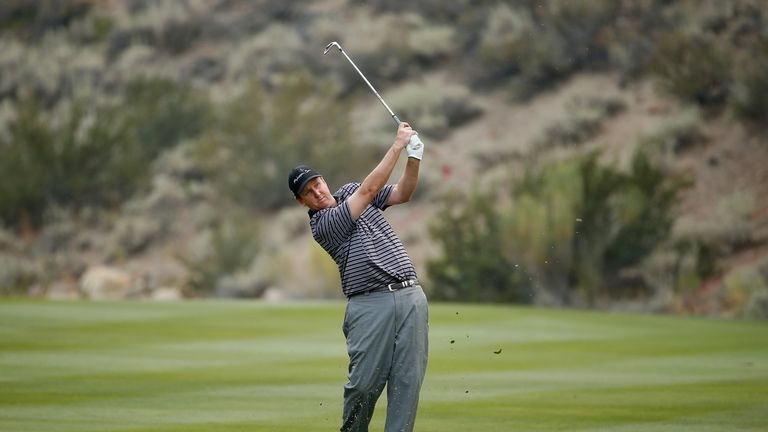 J.J. Henry plays his second shot on the 17th hole during the third round of the Barracuda Championship 