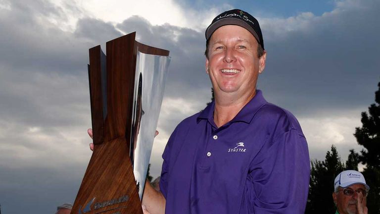 JJ Henry with the Barracuda Championship trophy