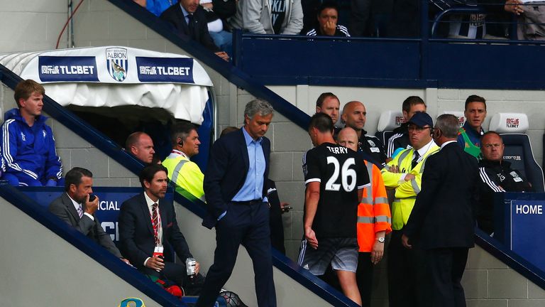 John Terry leaves the pitch after being sent off