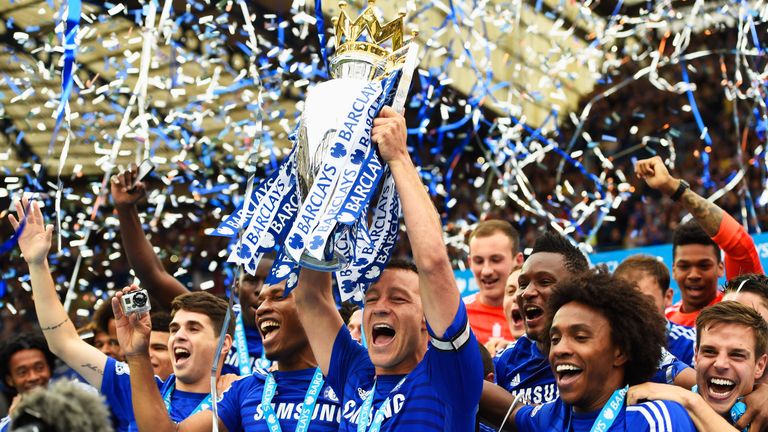 John Terry of Chelsea celebrates with the trophy after the Barclays Premier League match between Chelsea and Sunderland at Stamford Bridge on May 24, 2015