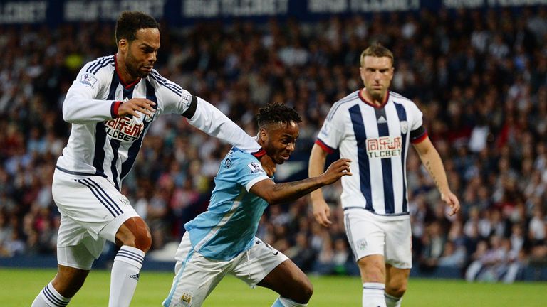 Manchester City's English midfielder Raheem Sterling (C) vies with West Bromwich Albion's English defender Joleon 