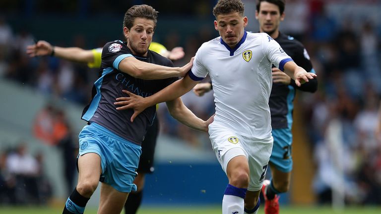 Kalvin Phillips of Leeds holds off Sam Hutchinson of Sheffield Wednesday 