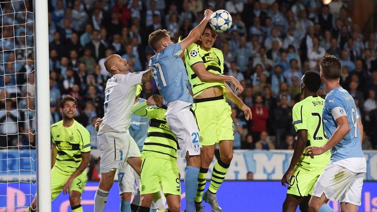 Malmo's Kari Arnason appears to handle the ball in his box but nothing is given to Celtic
