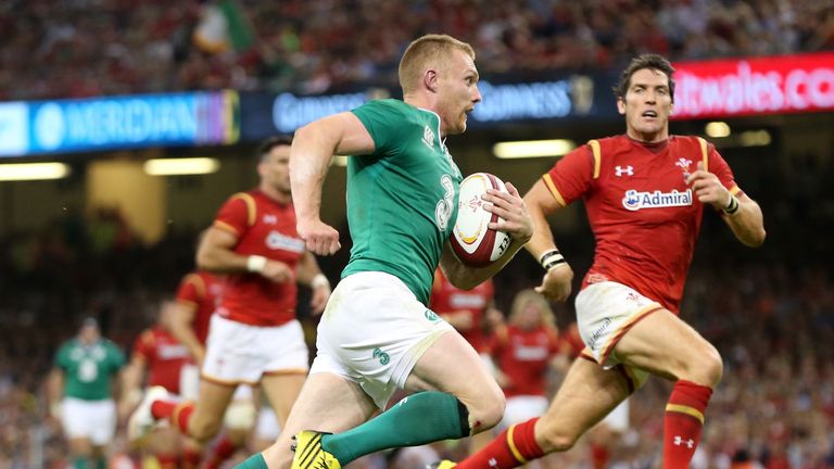  Keith Earls of Ireland breaks with the ball to score a try during the International match between Wales and Ireland 
