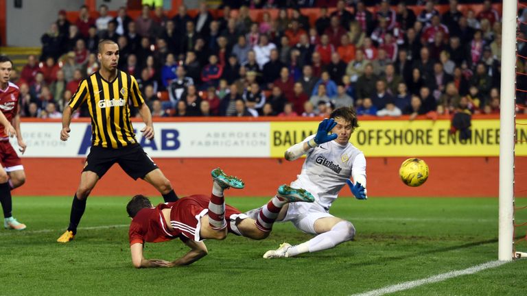 Kenny McLean squeezed a late header inside the post to bring Aberdeen back into the game but they couldn't score again to force extra-time