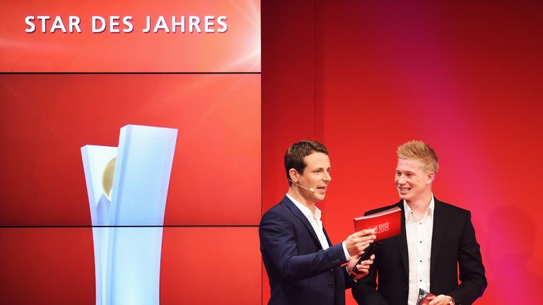 Kevin De Bruyne of Wolfsburg revieves his award at the Sport Bild Awards 2015