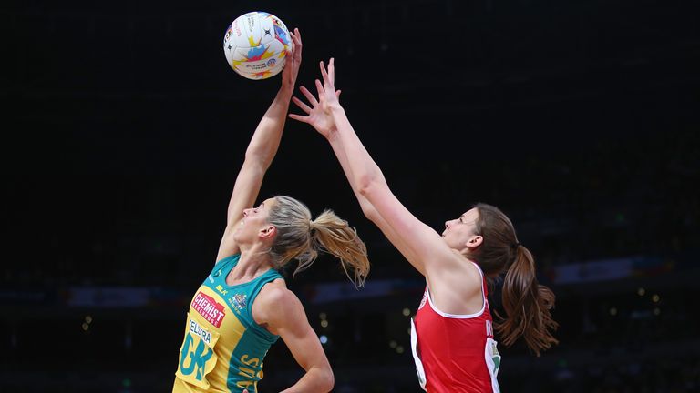  Laura Geitz of Australia and Georgia Rowe of Wales compete for the ball during the 2015 Netball World Cup match between 