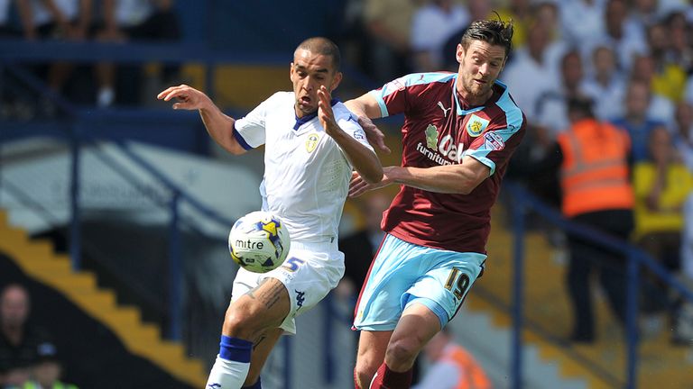Burnley's Lukas Jutkiewicz (right) scraps with Giuseppe Bellusci of Leeds
