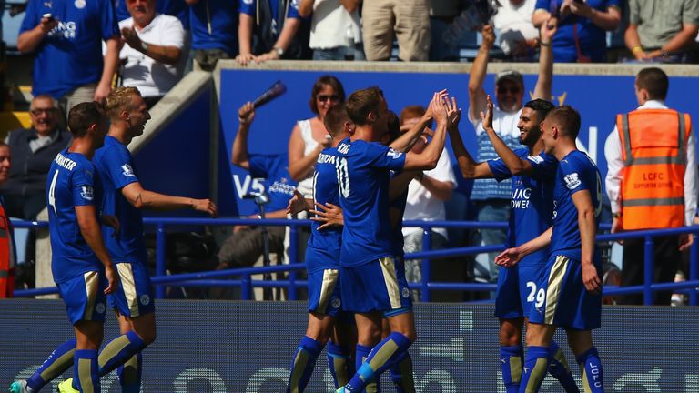 Riyad Mahrez (2nd R) of Leicester City celebrates scoring his team's second goal
