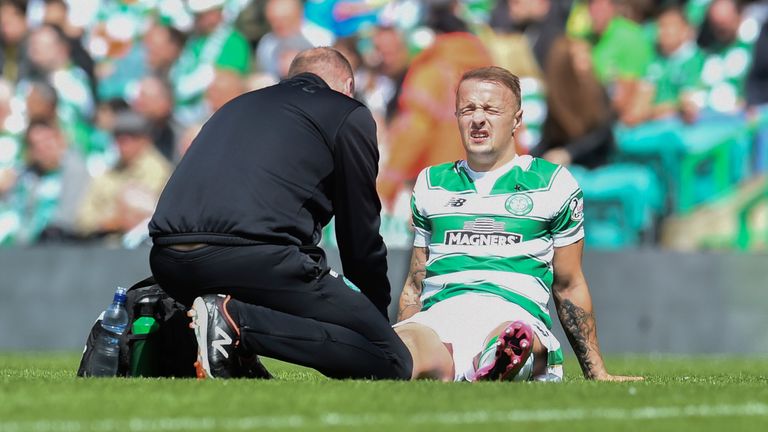 Leigh Griffiths receives treatment during Celtic's victory over Ross County