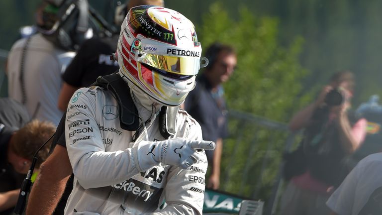 Lewis Hamilton celebrates a third career pole at Spa