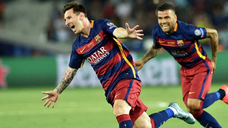 Lionel Messi celebrates scoring a goal during the UEFA Super Cup against Sevilla