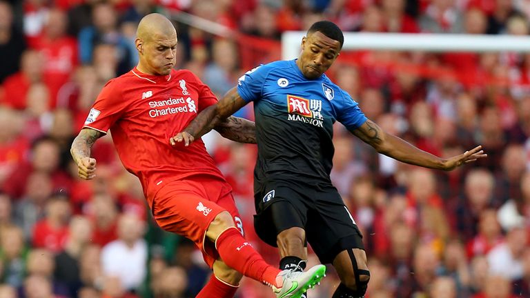 Liverpool's Martin Skrtel battles for the ball with AFC Bournemouth's Callum Wilson
