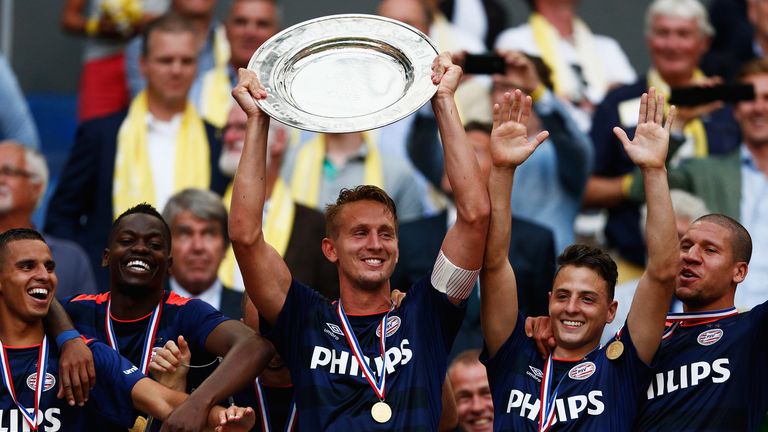 AMSTERDAM, NETHERLANDS - AUGUST 02:  Luuk de Jong of PSV holds the trophy and leads celebrations after winning the Johan Cruijff Shield match between FC Gr