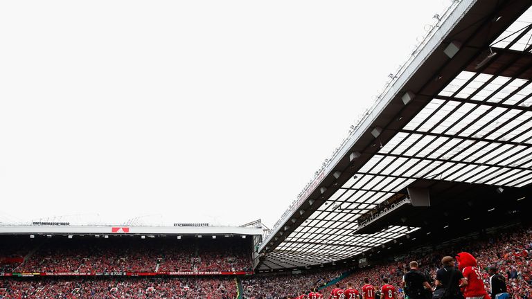 The players walk on to the pitch ahead of Man Utd v Newcastle