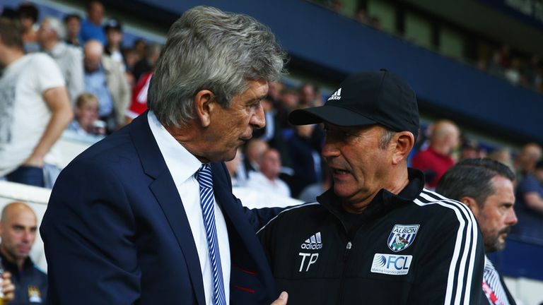 WEST BROMWICH, ENGLAND - AUGUST 10:  Manuel Pellegrini manager of Manchester City shake hands with Tony Pulis manager of West Bromwich Albion prior to the 