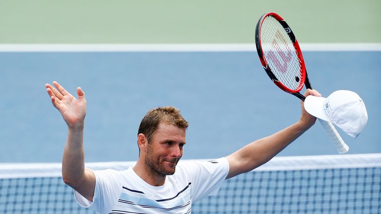 Mardy Fish of the United States celebrates after beating  Marco Cecchinato in round one of the US Open
