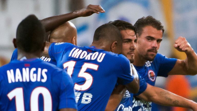 Caen's Andy Delort (C) celebrates after scoring against Marseille