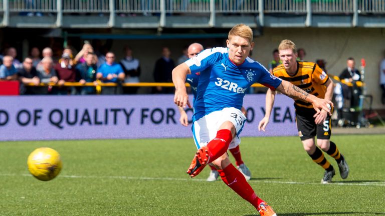 Martyn Waghorn scores from the spot for Rangers against Alloa. 