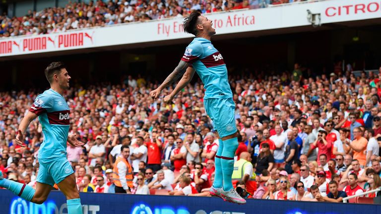 West Ham's Mauro Zarate celebrates after scoring against Arsenal