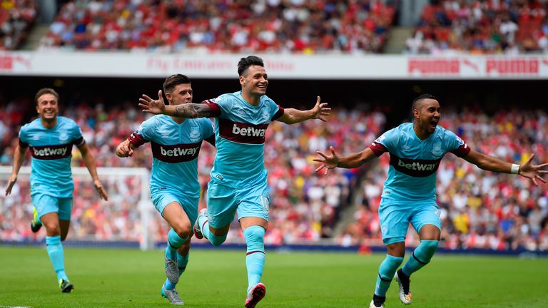 Mauro Zarate celebrates West Ham's second goal at the Emirates