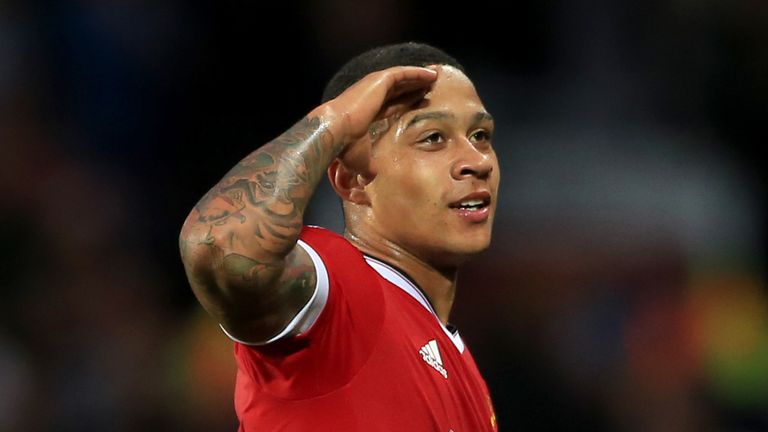 Manchester United's Memphis Depay celebrates scoring his side's second goal of the game during the UEFA Champions League Qualifying, Play-Off at Old Traffo