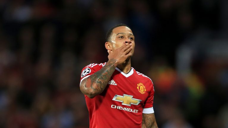 Manchester United's Memphis Depay celebrates scoring his side's second goal of the game during the UEFA Champions League play-off tie v Club Brugge